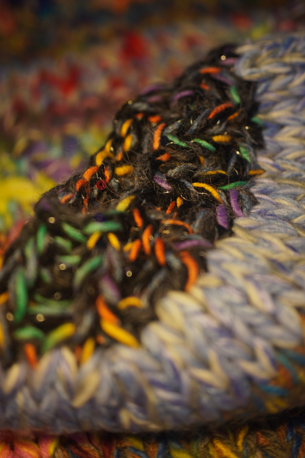 Spectral Shrug — Hand-Knitted Multicolour Bolero in Dark Rainbow
